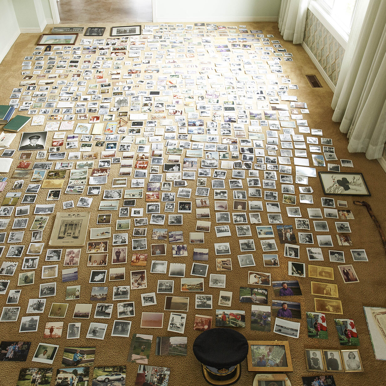 ALL OF HIM: Photograph of archives layed out on the floor