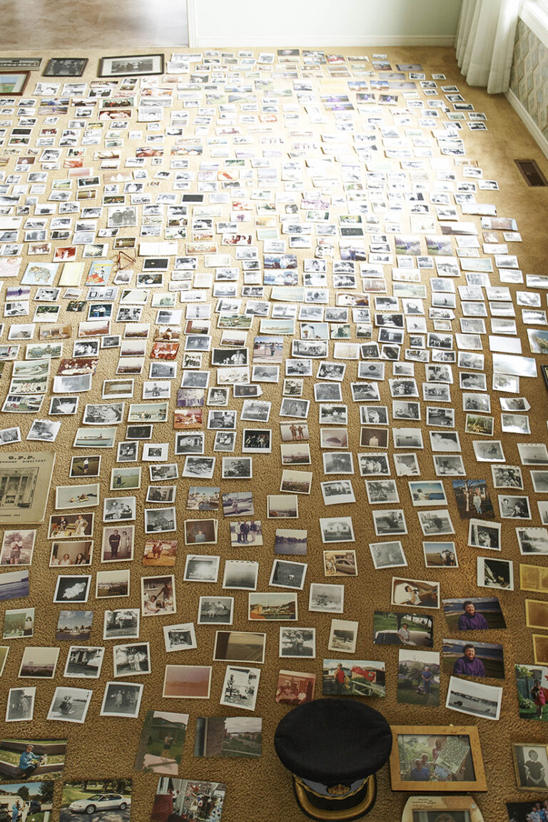 ALL OF HIM: Photograph of archives layed out on the floor