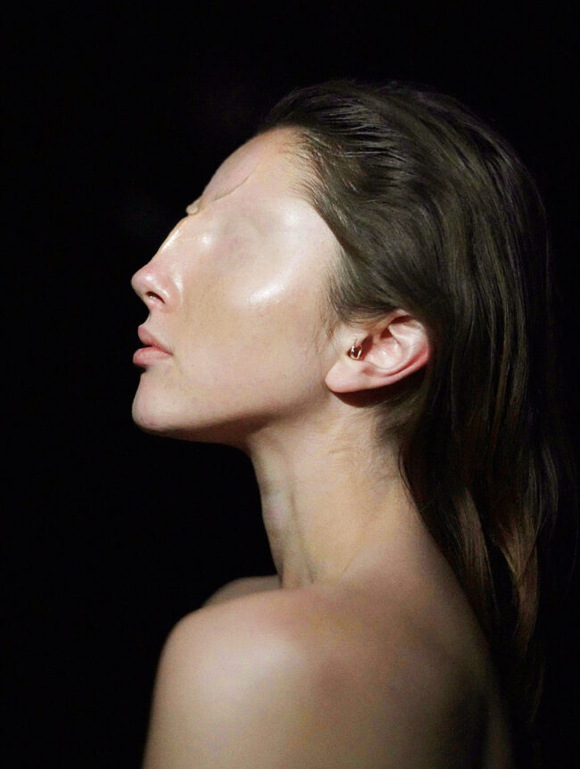 Side profile portrait with no eyes