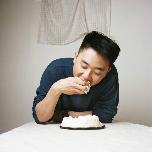 a self-Portrait of me eating a cheesecake