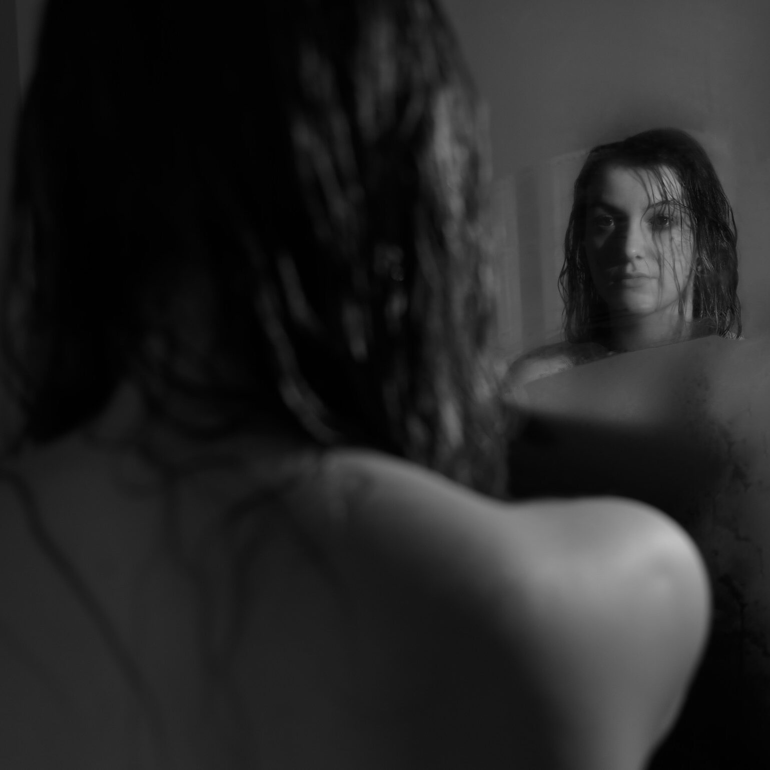 A photograph of me looking into the mirror, contemplating choices in my life this far