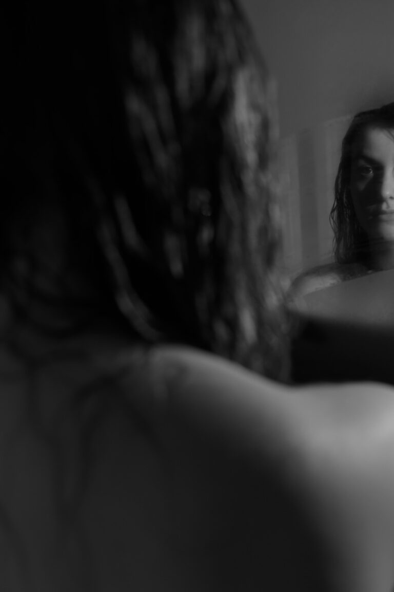 A photograph of me looking into the mirror, contemplating choices in my life this far