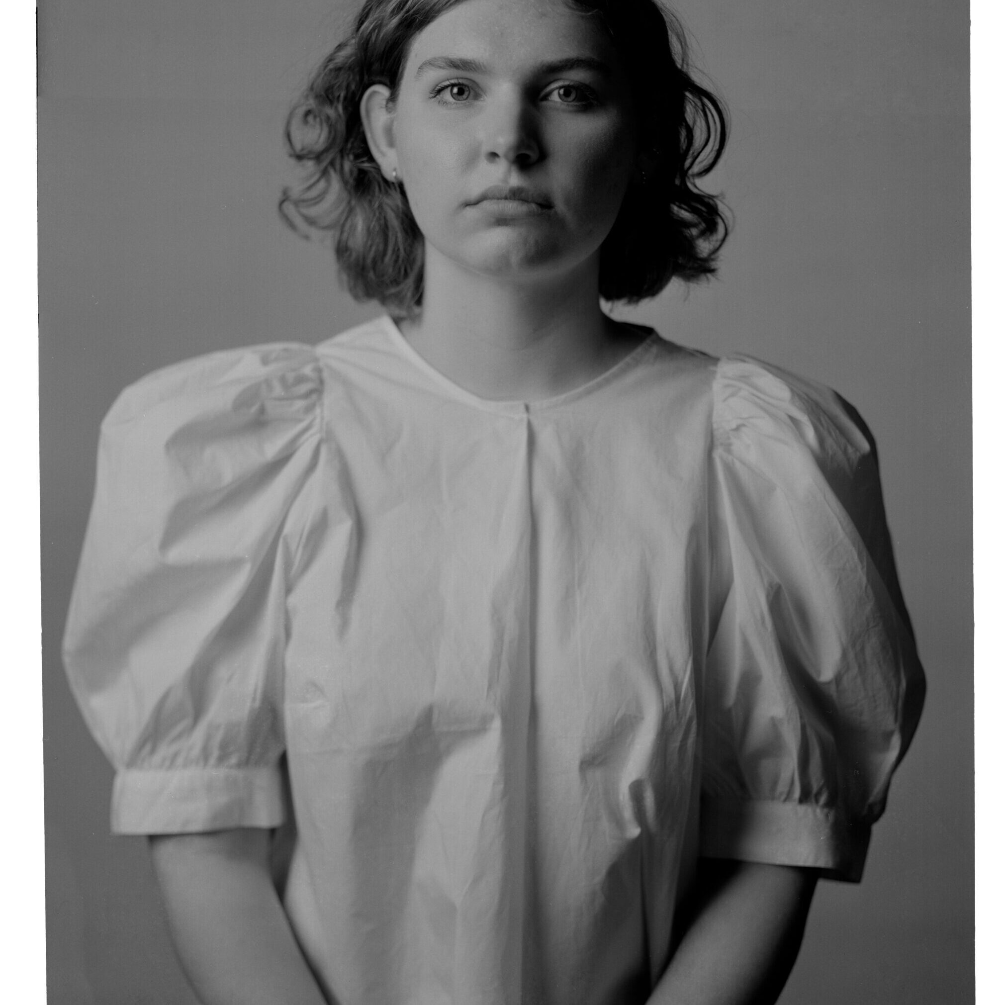 A black and white portrait of my friend Kenna,