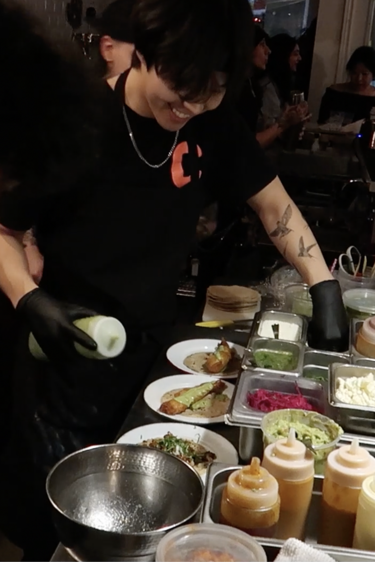 Back of house making food during a dinner rush.