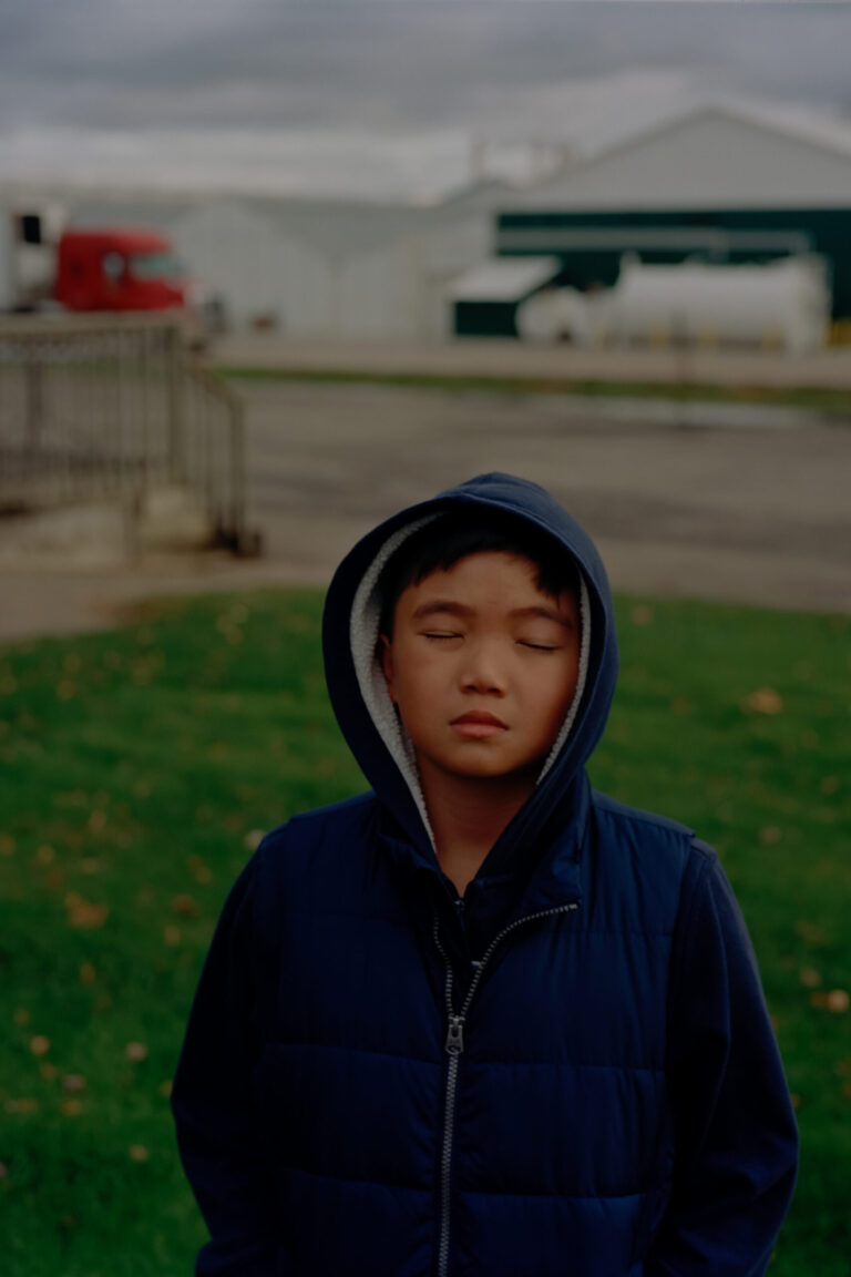 Image of a young boy with his eyes closed